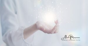 Hands releasing light, representing a conscious act of love